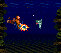 Donkey and Diddy on Enguarde the Swordfish charging a Chomps.